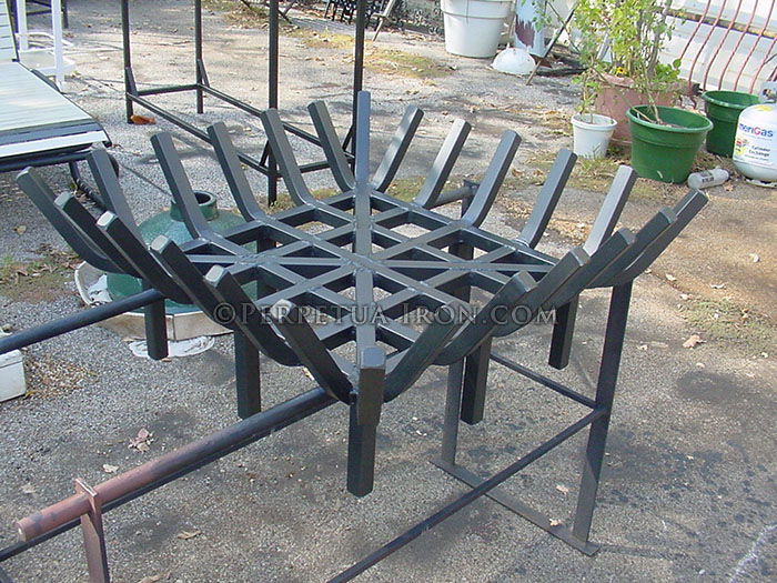 custom built, heavy duty fire grate for an outside fireplace square design