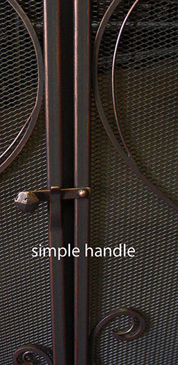 Simple handle design for holding a firescreen closed, deep bronze finish, hammered knob.
