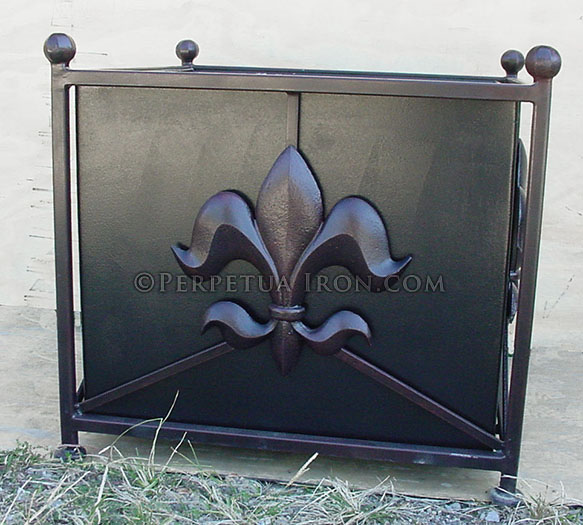 Fabricated steel, cube shaped, large decorative iron planter box with a fleur de lis on the sides.
