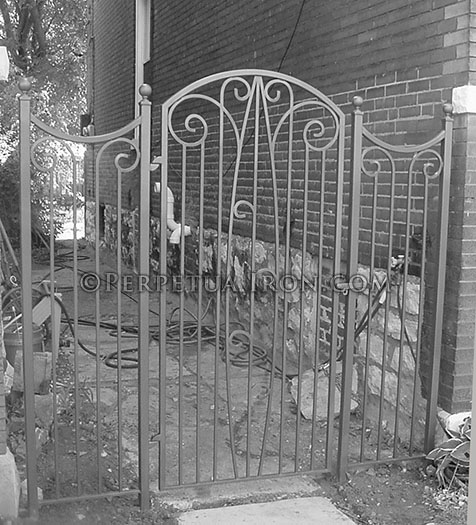 garden gate and stationary panels, custom designed wrought iron