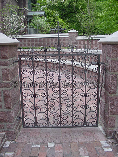 Wrought iron gate for a church columbarium, design based on Salisbury Cathedral gate
