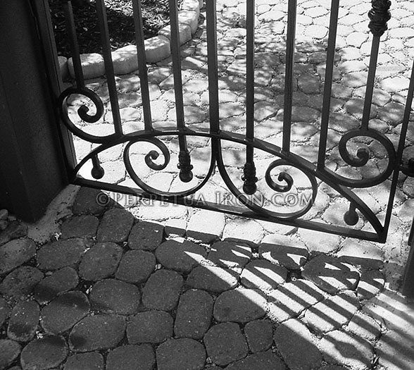 lower portion detail of 27.1, a wrought iron gate
