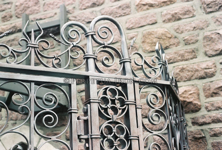 detail view of gate 40 showing some very complex ornamental iron work.