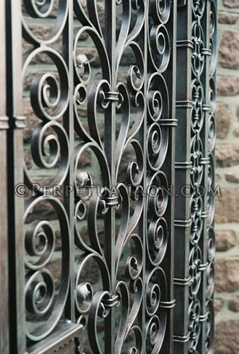 Close up detail shot of gate 40 featuring some very complex scroll work.
