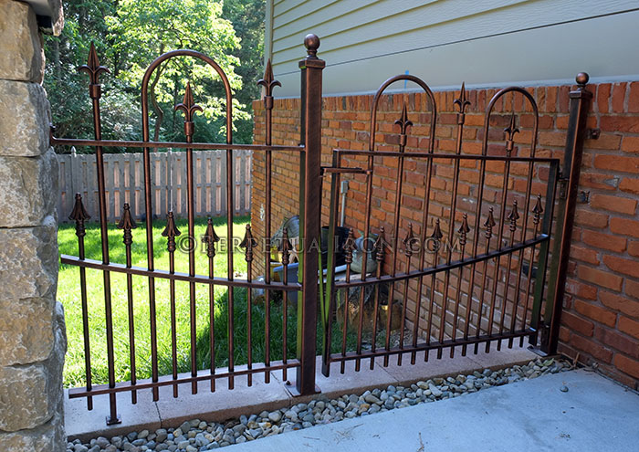 Loop and spear design in a custom iron gate.