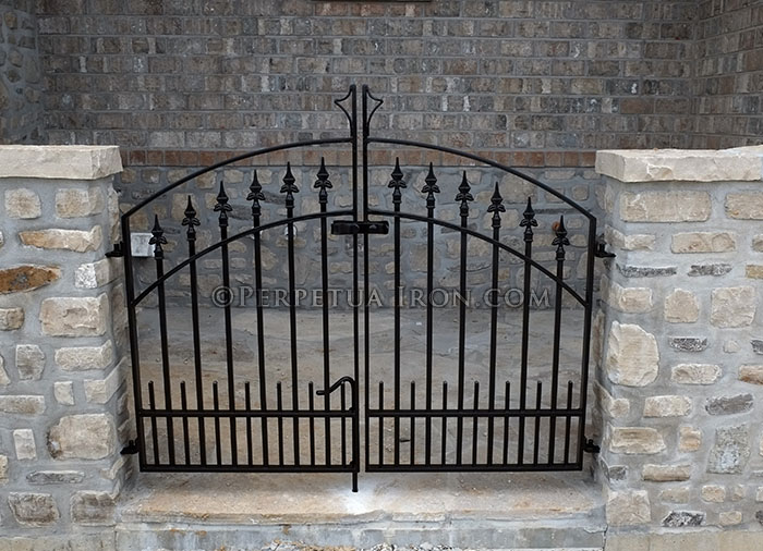 Custom iron gate for the entrance to a home.