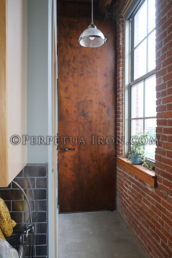 custom metal door for a loft residence