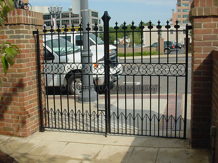Ornamental iron double gate, hand made design components.