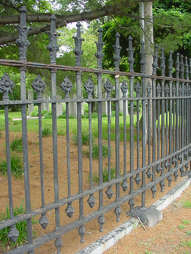 Cemetery rail with cast iron components, heavily built.