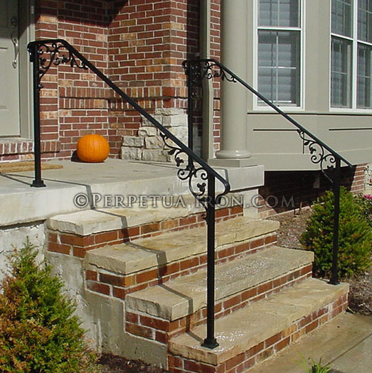 Wrought iron  railing for front steps, cast iron elements.